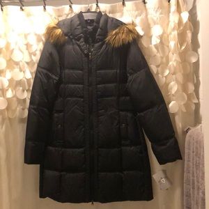 Black feather down jacket with faux fur hood
